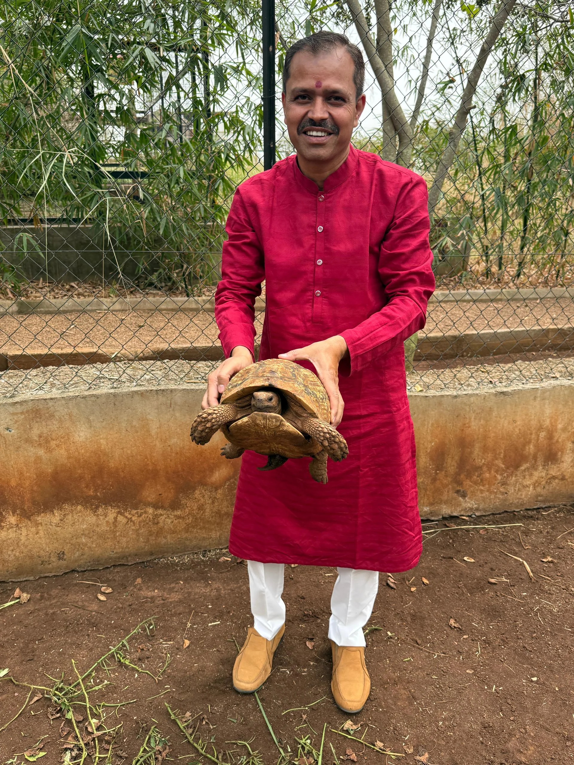 Image of Dr. Karthik Jha with a client 17