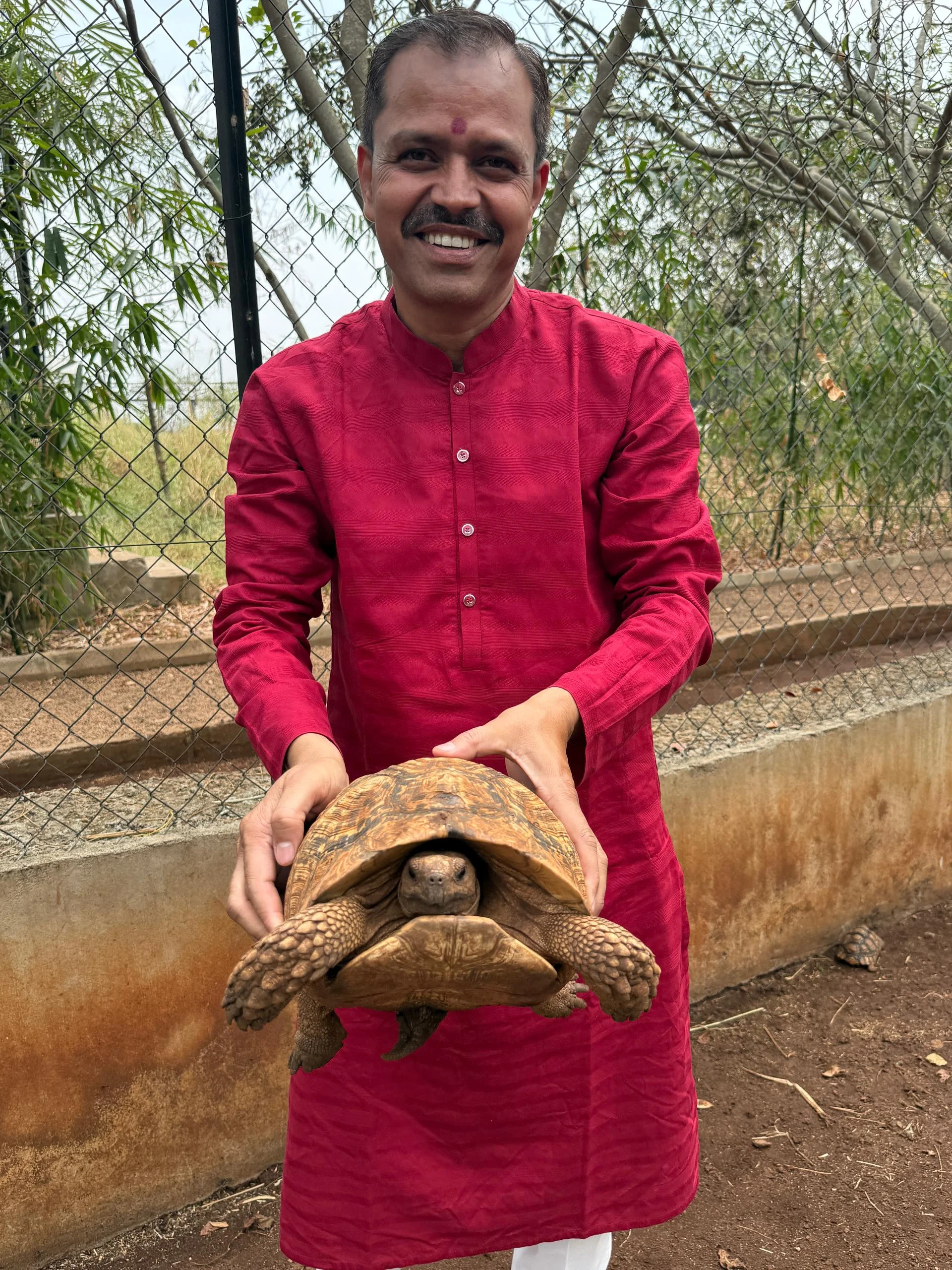 Image of Dr. Karthik Jha with a client 19